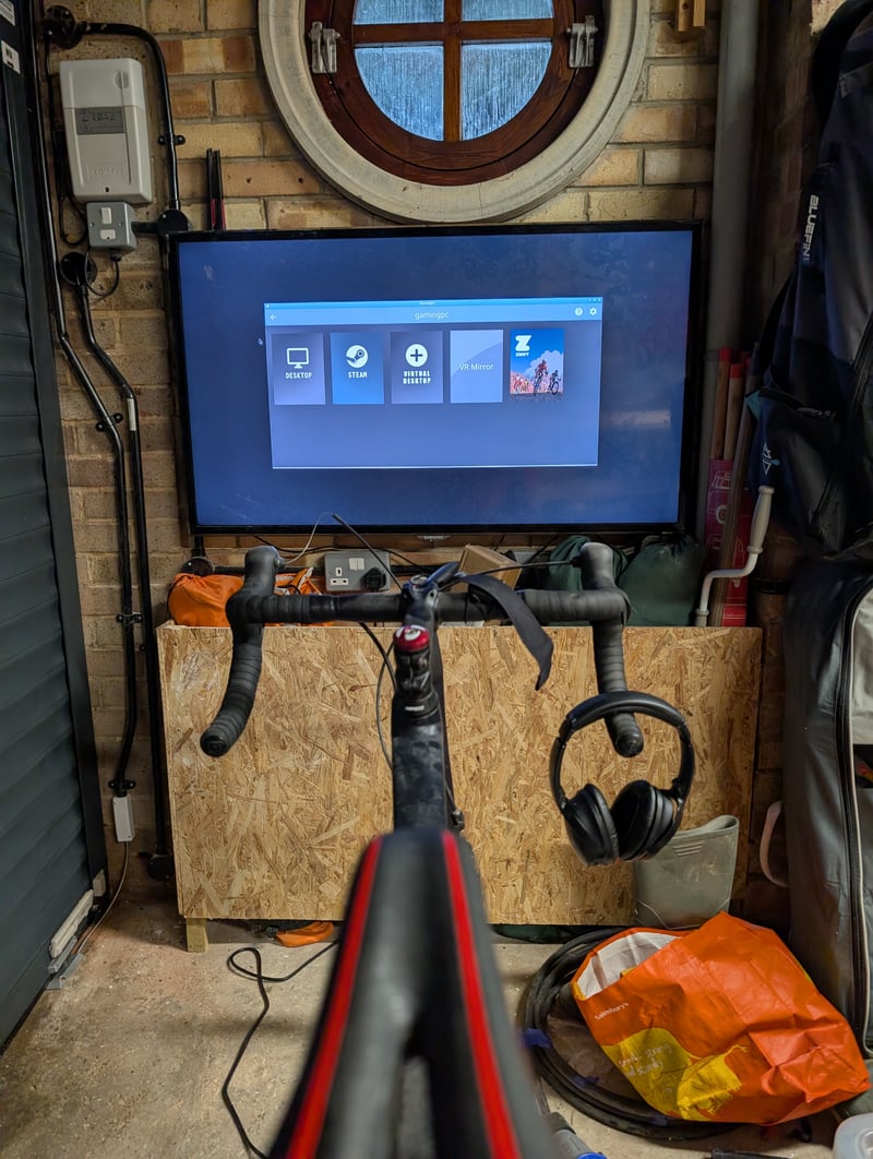 An indoor bike facing a TV